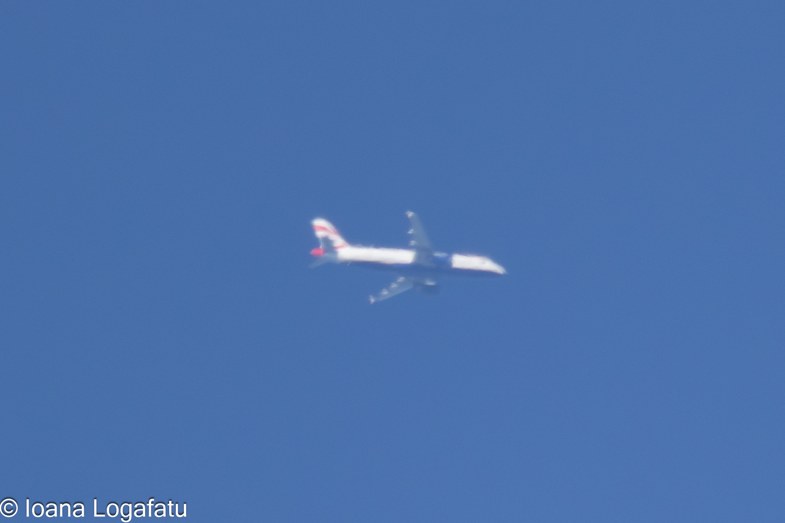 Airborne journey across blue horizons in daylight